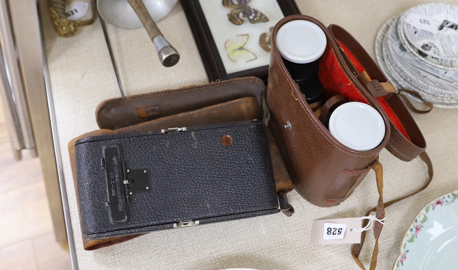 A Kodak camera and pair of Elite 20x50 field binoculars No. 09703